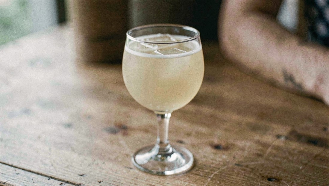 A pale Bamboo cocktail in a small stemmed glass
